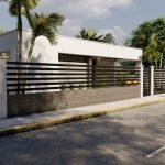 Auto voor modern huis met witte gevel en palmbomen