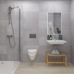 Badkamer met douche tegels in grijs en patroon