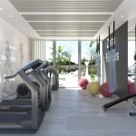 Fitnessruimte met uitzicht op tuin en fitnessapparatuur