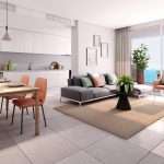 Modern interieur van woonkamer met keuken en zeezicht