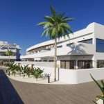 Appartementencomplex met groene paden en palmbomen